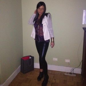 The White blazer with spikes